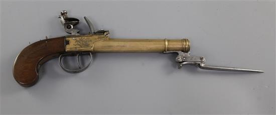 A Belgian brass framed and brass cannon barrelled flintlock boxlock overcoat pistol, 10.5in (14.5in with bayonet)